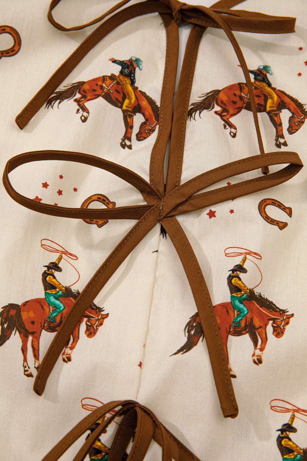 Apricot Rodeo Print Tied Front Puff Sleeve Peplum Top